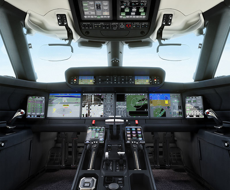 G800 Flight Deck equipped with four large screens, two smaller screens and two pull-down heads up displays